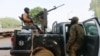 FIE - A soldier sits on one of the trucks in the northwest Nigerian state of Zamfara, Nigeria, March 2, 2021. 