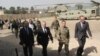 U.S. Defense Secretary Jim Mattis, second left, arrives at NATO's Resolute Support mission in Kabul, Afghanistan on Sept. 7, 2018. 