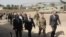 U.S. Defense Secretary Jim Mattis, second left, arrives at NATO's Resolute Support mission in Kabul, Afghanistan on Sept. 7, 2018. 