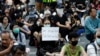 FILE - Protesters gather during a rally in Hong Kong, Nov. 15, 2019.
