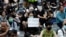 FILE - Protesters gather during a rally in Hong Kong, Nov. 15, 2019.