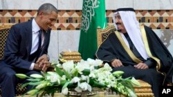 Le président Barack Obama (à g.) et le roi Salman d'Arabie Saoudite (AP)