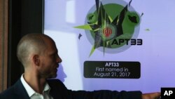 Alister Shepherd, the director of a subsidiary of the cybersecurity firm FireEye, gestures during a presentation about the APT33 hacking group, which his firm suspects are Iranian government-aligned hackers, in Dubai, United Arab Emirates, Tuesday,…