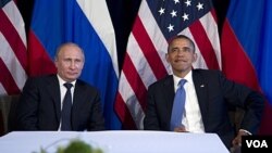 باراک اوباما و ولادیمیر پوتین، در اجلاس جی-۲۰ در مکزیک 