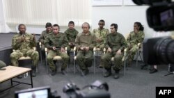 Иностранные наемники-военнопленные, захваченные в качестве комбатантов в составе российских вооруженных сил, вторгшихся в Украину. Киев, 15 марта 2024 года.