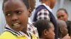 Masai girls singing songs at Priscilla Nangurai's rescue center in Kajiado, Kenya, on July 13, 2012. (VOA/Jill Craig)