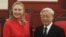 U.S. Secretary of State Hillary Clinton (L) poses for a photo with Vietnam's Communist Party's General Secretary Nguyen Phu Trong at the Party's Head Office in Hanoi, July 10, 2012.