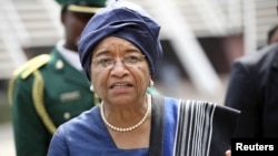 Liberia's President Ellen Johnson Sirleaf disputes claims of a member of parliament regarding amounts paid to U.S. lobbying firms.