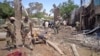 FILE - Security forces attend to the scene following a car bomb attack in Beledweyne, Somalia, Nov. 19, 2013. A new attack killed at least three people, wounded at least 13 others in Beledweyne, Sept. 10, 2017. 