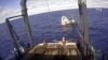 SpaceX Crew Capsule Ends Test Flight With Ocean Splashdown