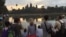 International tourists take photos of Angkor Wat temple as the sun rise in Siem Reap, Cambodia, on Sunday, January 10, 2016. (Hul Reaksmey/VOA Khmer) 
