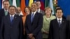 President Barack Obama takes his place with other leaders for the Family Photo during the G20 Summit, Monday, June 18, 2012, in Los Cabos, Mexico. 