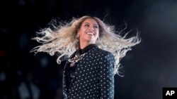 FILE - Beyoncé performs at the Wolstein Center, Nov. 4, 2016, in Cleveland, Ohio. Beyoncé is full of surprises — and on Tuesday, March 12, 2024, dropped yet another one. Her forthcoming album has a name: Act II: Cowboy Carter. (AP Photo/Andrew Harnik, File)