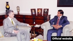 People take a tour in an &quot;upside down home&quot; in St. Petersburg, Russia. The exhibition charges less than $10 for a walk through three-room and two-bathroom house.