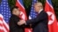 FILE - U. S. President Donald Trump shakes hands with North Korea leader Kim Jong Un at the Capella resort on Sentosa Island, June 12, 2018 in Singapore.