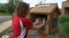 The idea behind the little free libraries was born three years ago in Hudson, Wisconsin, when former teacher and book lover built a miniature model of a library. (VOA)