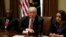 President Donald Trump talks to reporters during his meeting with immigration crime victims at the White House in Washington, June 28, 2017. 