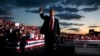 President Donald Trump pumps his fist to the crowd after speaking to a campaign rally in Montoursville, Pa., May 21, 2019. 