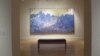 The painting "Aspiration" by Augustus Vincent Tack is seen at The Phillips Collection, in Washington, D.C., March 2014. (J. Taboh/VOA)
