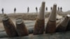 Afghan border policemen discovered a cache of ammunitions and missiles at a weapons cache in Goshta district, Nangarhar province, east of Kabul, Afghanistan, police officials said, January 14, 2012.