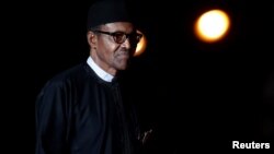 Nigeria's President Muhammadu Buhari arrives at the Orsay Museum, in Paris, Nov. 10, 2018.