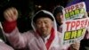 FILE - A protester shouts slogans during a rally against the Trans-Pacific Partnership (TPP) in Tokyo, Tuesday, April 22, 2014.