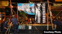 Natasha poses for photographers with a vintage Fiat-Abarth 1000 Pininfarina to promote the vintage car show &#39;Techno Classica&#39; in Essen, Germany.