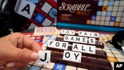FILE - A Scrabble game with larger tiles is displayed at the 2023 Toy Fair, in New York's Javits Center, Monday, Oct. 2, 2023. (AP Photo/Richard Drew)
