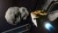 Illustration of NASA's DART spacecraft prior to impact at the Didymos binary asteroid system