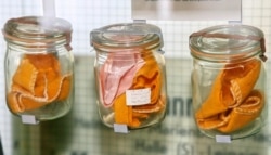 FILE - Odor samples used by the former East German secret service Stasi are displayed at an exhibit at the museum "Zeitgeschichtliches Forum" (Forum for Contemporary History), in Leipzig, Germany, May 23, 2007.