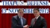 U.S. Secretary of Defense Leon Panetta, left, and his Thai counterpart Sukampol Suwannathat shake hands after signing the 2012 Joint Vision Statement for the Thai - US Defense Alliance during a joint press conference following meetings at the Ministry of 