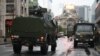 The military presence in Brussels appeared lighter on Tuesday as schools prepared to reopen on Wednesday, Nov. 24, 2015.