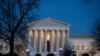 Night falls on the Supreme Court in Washington, Jan. 22, 2020.