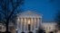 Night falls on the Supreme Court in Washington, Jan. 22, 2020.