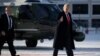 President Donald Trump gestures as he arrives in Davos, Switzerland on Marine One, Jan. 21, 2020. 