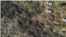 This file aerial view taken on November 21, 2020 shows a cemetery where alleged victims of the November 9, 2020 massacre were buried in collective graves, in Mai Kadra, Ethiopia.