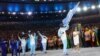 Flag-bearer Mohamed Daud Mohamed of Somalia leads his contingent during the opening ceremony at the 2016 Rio Olympics in Rio de Janeiro, Brazil, Aug. 5, 2016.