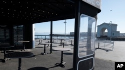 FILE - The Paycheck Protection Program is supposed to help small businesses such as the closed Franciscan Crab Restaurant at Fisherman's Wharf in San Francisco, April 24, 2020.