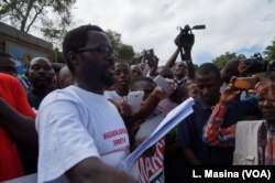 Masauko Thawe, demonstration coordinator for Blantyre, reads a petition during the anti-corruption march in Malawi, April 27, 2018.