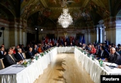 በዩናይትድ ስቴትስ እና በሩሲያ የተመራ 17 አገሮች ያሉበት ዓለም አቀፉ ጉባኤ