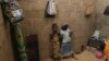 FILE - Children who escaped Boko Haram attacks in both Nigeria and Cameroon are seen inside an uncompleted house as they seek shelter in Adamawa, Nigeria, Jan. 31, 2015. 