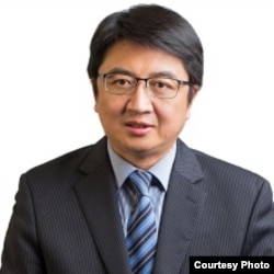 美国西东大学外交与国际关系学院副教授汪铮