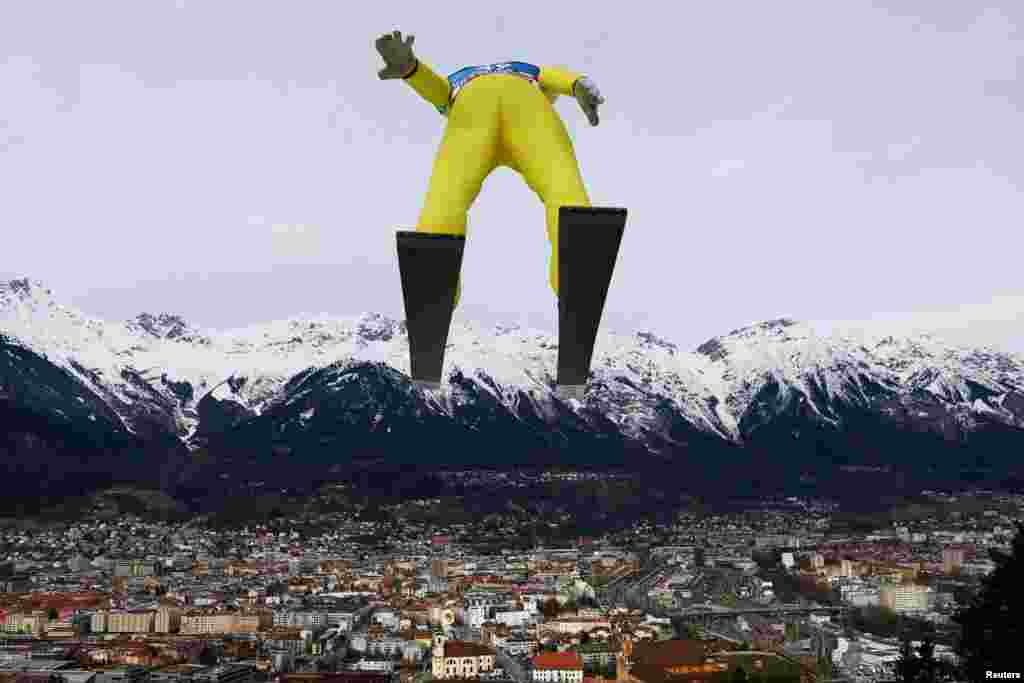 Slovenia's Timi Zajc soars through the air during a training session for Ski Jumping 4 Hills Tournament at Innsbruck, Austria, Jan. 2, 2024.