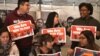 Youths in support of a clean DREAM Act confer at Dream Act Central, a tent space on Washington's National Mall, Dec. 13, 2017. (A. Barros/VOA)