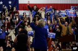 Democratic presidential candidate Hillary Clinton waves to supporters before speaking during a rally in New York on March 2, 2016.