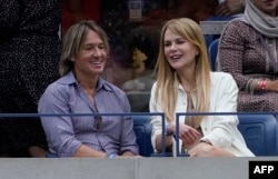 Supružnici - australijska glumica Nikol Kidman i američki muzičar Kit Urban - na tribinama Flašing Medouza (Foto: AFP/Timothy A. Clary)