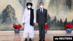 中国外长王毅今年7月在天津会晤塔利班代表