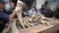 Malaysian customs officers show elephant tusks which were recently seized in Port Klang outside Kuala Lumpur December 11, 2012.
