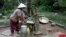 A villager in Samrong commune pumps water out of a well, Svay Rieng province, Cambodia, July 18, 2017. (Sun Narin/VOA Khmer)