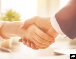 A handshake is something many members of Gen Z have not practiced. (AP Photo)